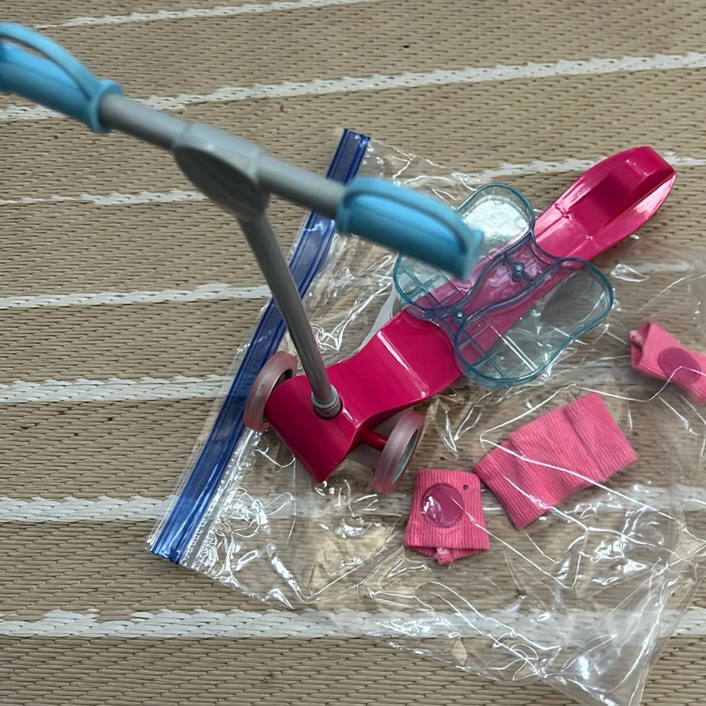 NWOT 18” doll scooter, elbow and knee pads